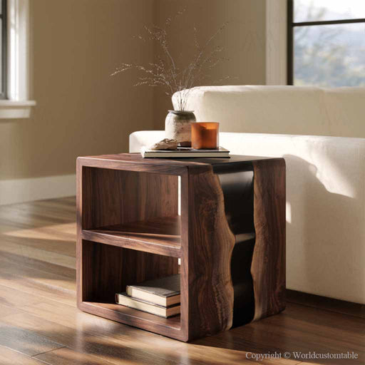 Close up of black epoxy resin and distinctive black walnut grain on a handcrafted sofa table