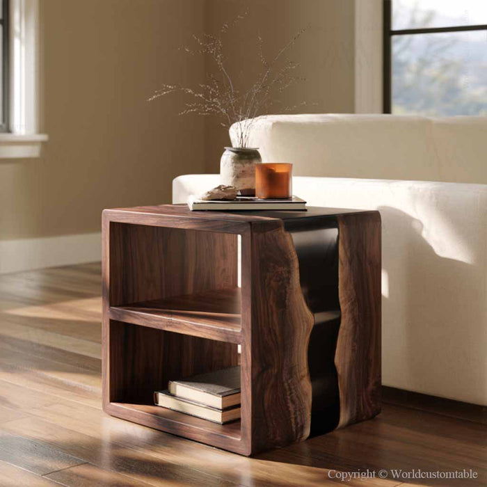 Close up of black epoxy resin and distinctive black walnut grain on a handcrafted sofa table