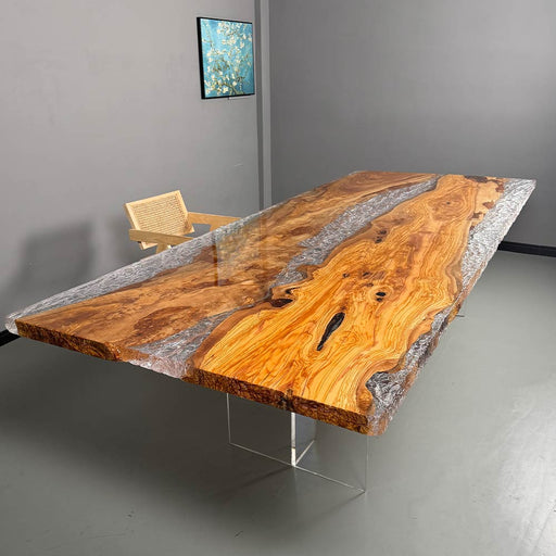 Designer olive wood resin dining table styled in modern Scandinavian home décor.