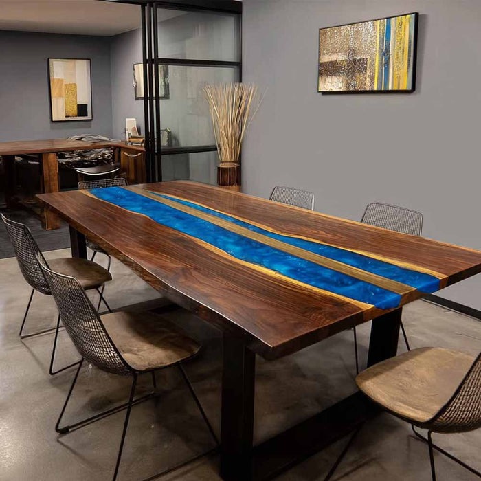 Dining room with a wooden table featuring a blue resin inlay and chairs.
