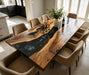 Dramatic black walnut dining table with deep black marbled epoxy river, industrial high-gloss scratch-resistant finish