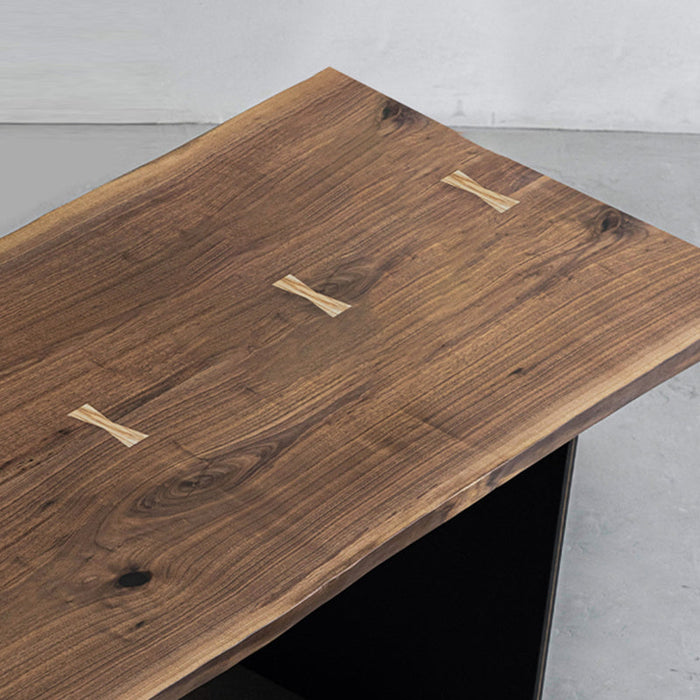 Elegant black walnut table suitable for dining rooms or executive office spaces.