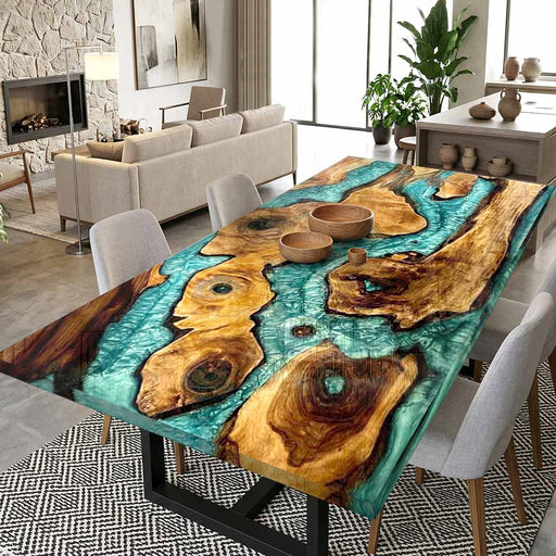 Luxury live edge wood dining table featuring a vibrant emerald green epoxy resin river center, designed to accommodate 6 to 8 people. Perfect for modern rustic dining room decor.