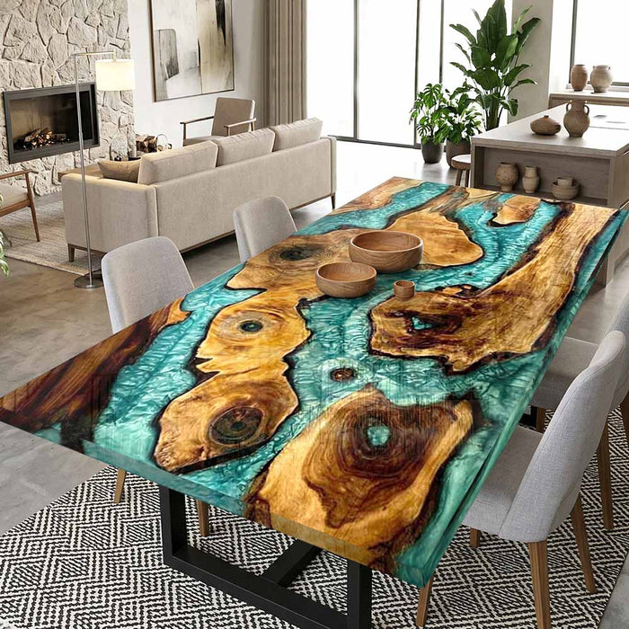 Luxury live edge wood dining table featuring a vibrant emerald green epoxy resin river center, designed to accommodate 6 to 8 people. Perfect for modern rustic dining room decor.