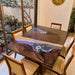 Epoxy coffee table made of black walnut wood featuring illuminated floral resin art design