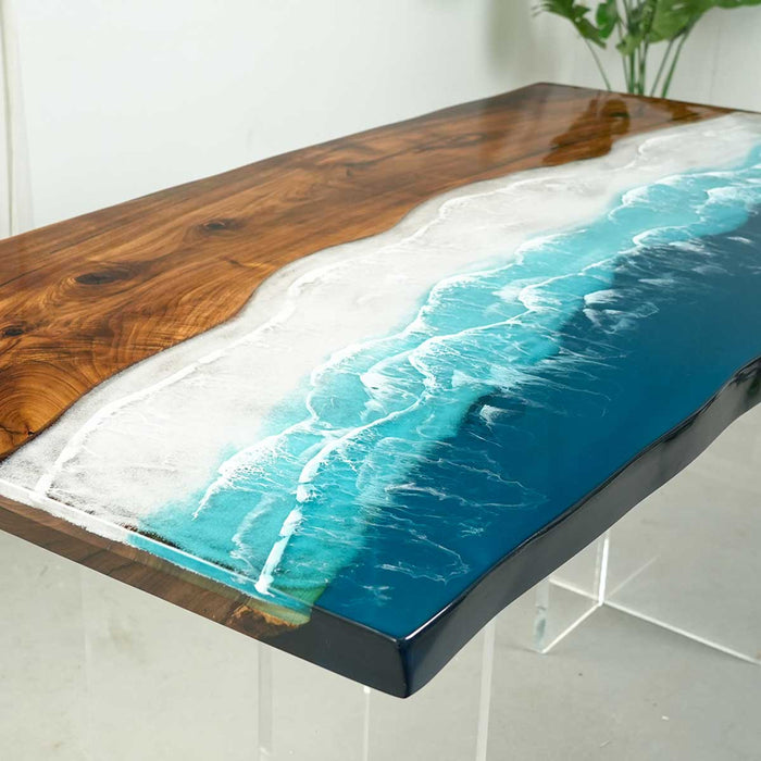 Wooden table with blue resin inlay on a white background
