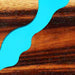 Close-up of a wooden surface with a blue river-like design