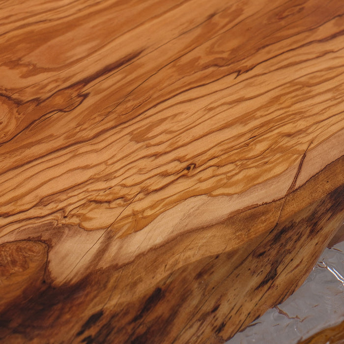 Ice effect epoxy river dining table made from olive wood slab