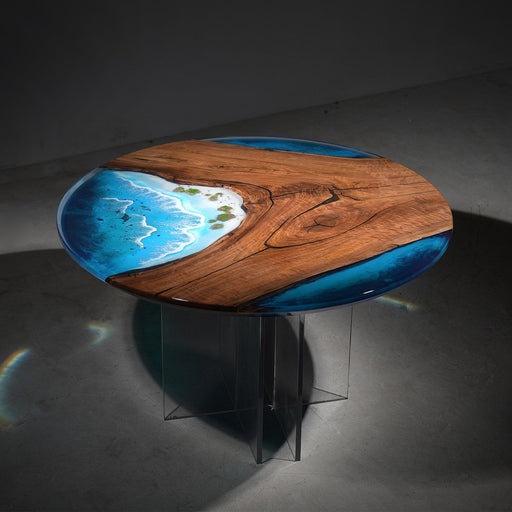 Exquisite epoxy river table with black walnut slabs and multi-layer gradient blue resin from deep ocean blue to aqua.