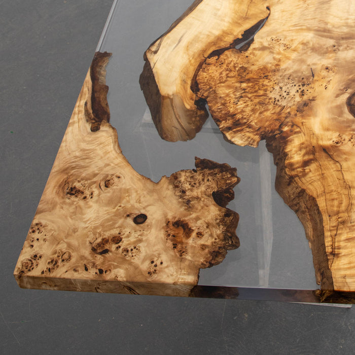 Epoxy river table made from golden camphor wood slab