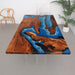 Epoxy River Table Featuring Olive Burl Wood and Blue Resin