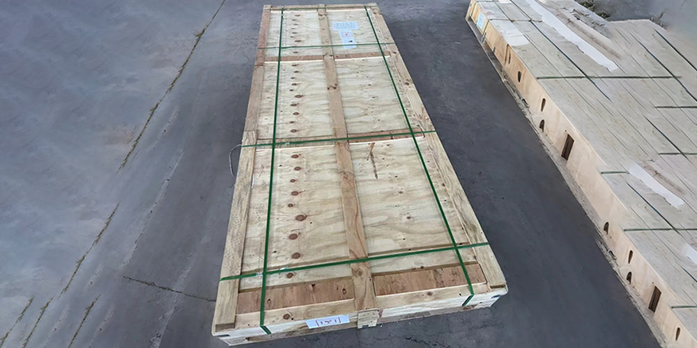 Final inspection and display of finished custom epoxy river table before packaging