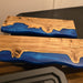 Floating wall shelf made with custom wood and blue epoxy, perfect for living room, kitchen, or office