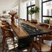 Artistic wood table with black resin river and preserved flowers