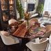 Top view of floral resin bloom design on epoxy dining table with natural wood accents