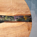 Flower inspired resin design on a black walnut epoxy dining table