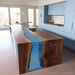 Glossy blue resin waterfall table in modern home interior