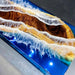Close-up of a wooden surface with resin and LED lights