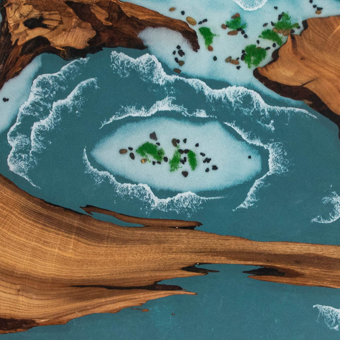 Handcrafted epoxy river table inspired by ocean waves and islands