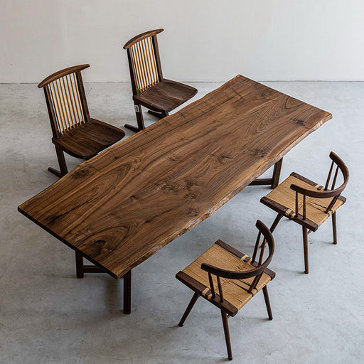 Handcrafted premium solid wood table made from black walnut with rich natural grain