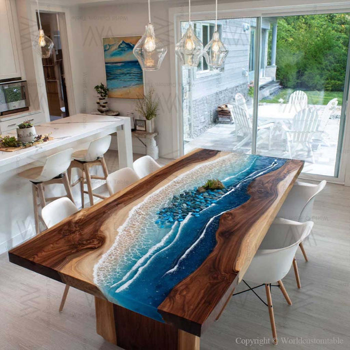 Dining room with a unique wooden table featuring a blue resin design.