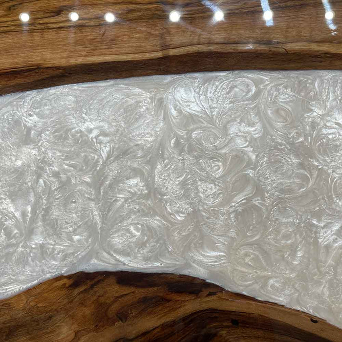 Handcrafted black walnut and white swirl epoxy resin table made for Los Angeles luxury interiors.