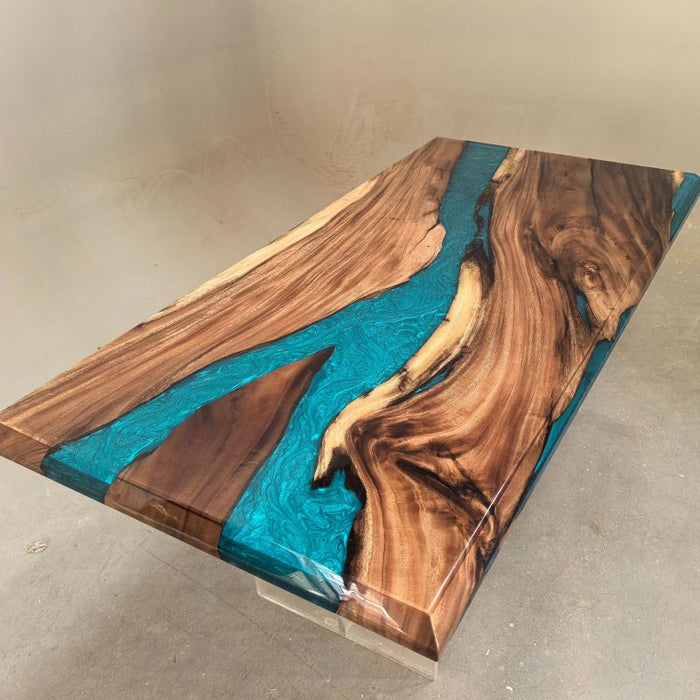 Handcrafted blue green epoxy dining table with natural walnut grain