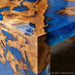 Handcrafted burl wood waterfall table with blue epoxy resin