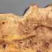 Handcrafted camphor wood and resin table in luxury interior