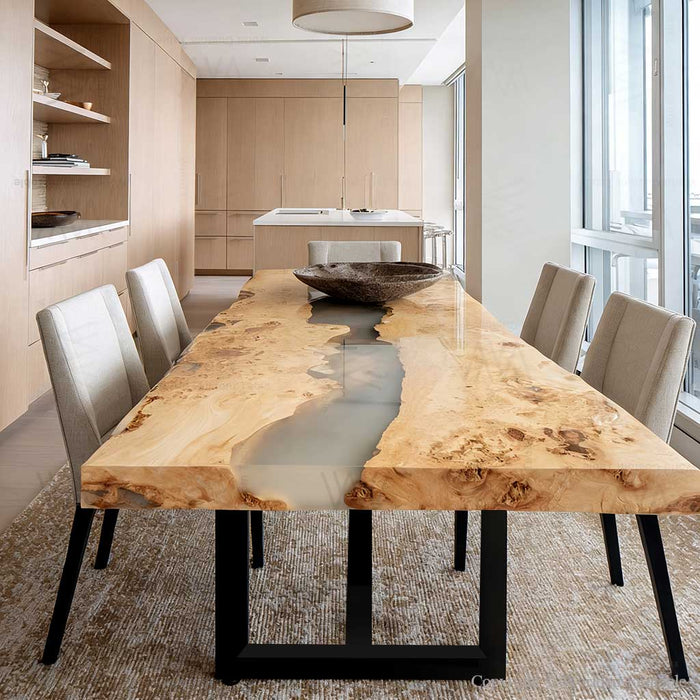 Handcrafted epoxy dining table showing live edge and resin detail