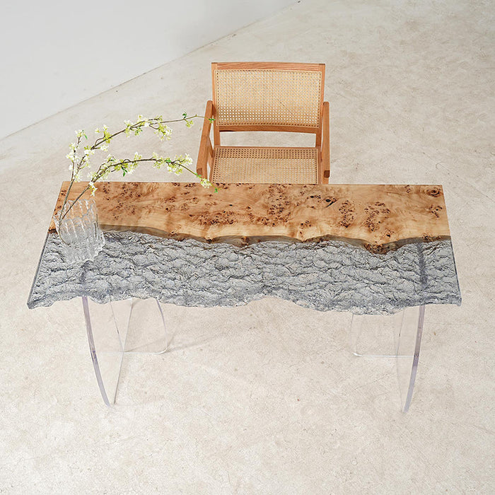 Handcrafted epoxy ice river table made from burl maple and transparent resin
