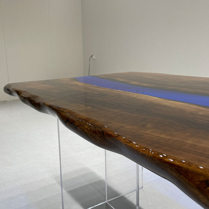 Handcrafted epoxy resin art table showcasing master-level wood stabilization and resin pouring techniques.