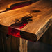 Wooden table with red resin inlay