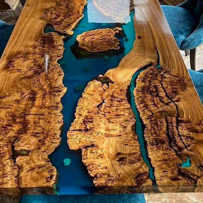 Wooden table with blue resin inlay