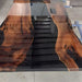 Handcrafted live edge conference table made with walnut wood and epoxy resin for premium interiors