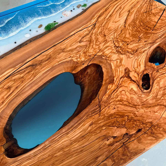 Handcrafted live edge walnut table featuring ocean resin inlay