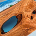 Handcrafted live edge walnut table featuring ocean resin inlay