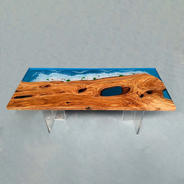 Handcrafted live edge walnut table featuring ocean resin inlay