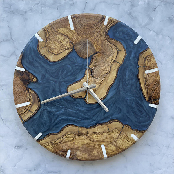 Handcrafted natural wood wall clock with bold resin design