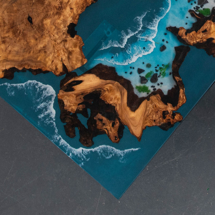 Handcrafted epoxy table with ocean design and cedar burl wood
