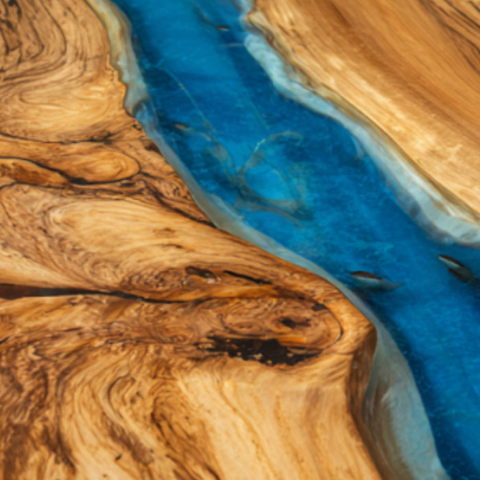 Wooden surface with blue resin inlay