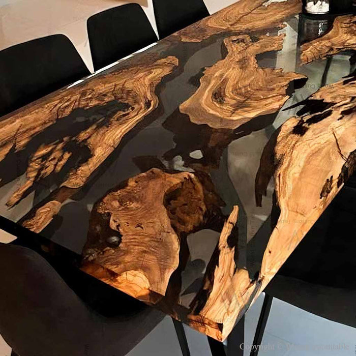 Handcrafted olive wood epoxy table in a luxury interior setting