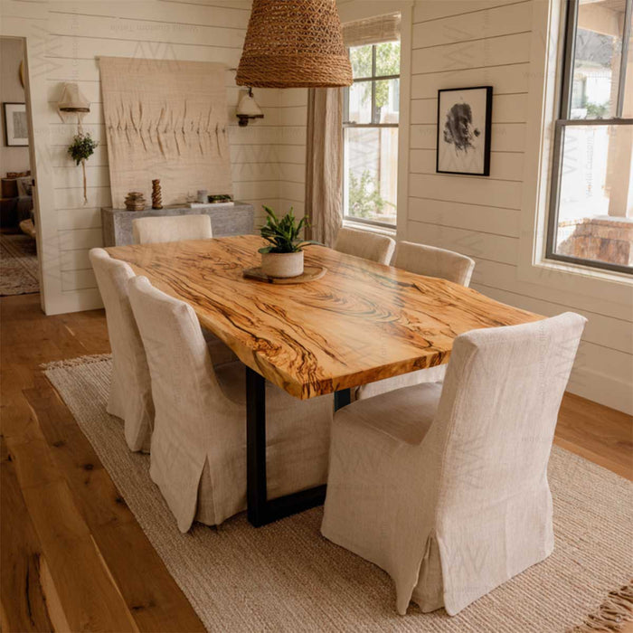 Handcrafted olive wood family dining table with organic live edge