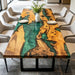Handmade olive wood epoxy resin table with glossy green river design