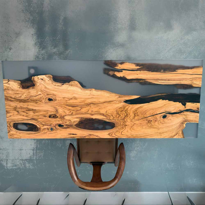 Wooden console table with a unique grain pattern on a gray textured wall background