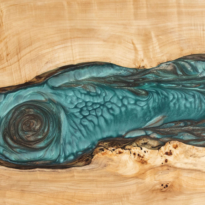 Handcrafted dining table made from poplar wood and green resin