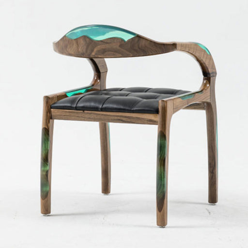 Modern chair with wooden frame and black leather seat on a white background