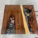 Artistic walnut epoxy coffee table with flower-inspired resin inlay and warm LED glow