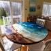 Handcrafted walnut epoxy river table with ocean-inspired resin design
