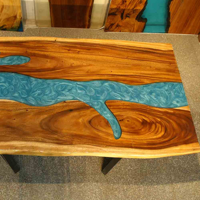 Handcrafted walnut epoxy river dining table for modern homes